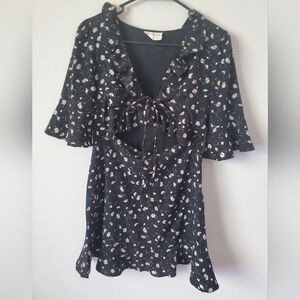 Vestique Dainty Floral Black Dress with Ruffle Details and Front Cut Out